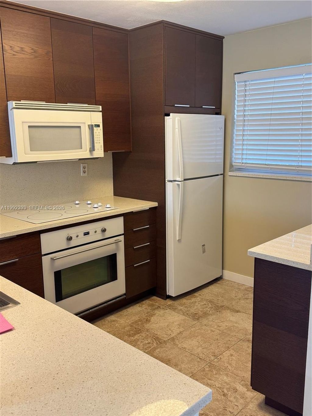 Photo of 1811 Sabal Palm Dr #403, Davie, FL 33324 (MLS # A11992393)