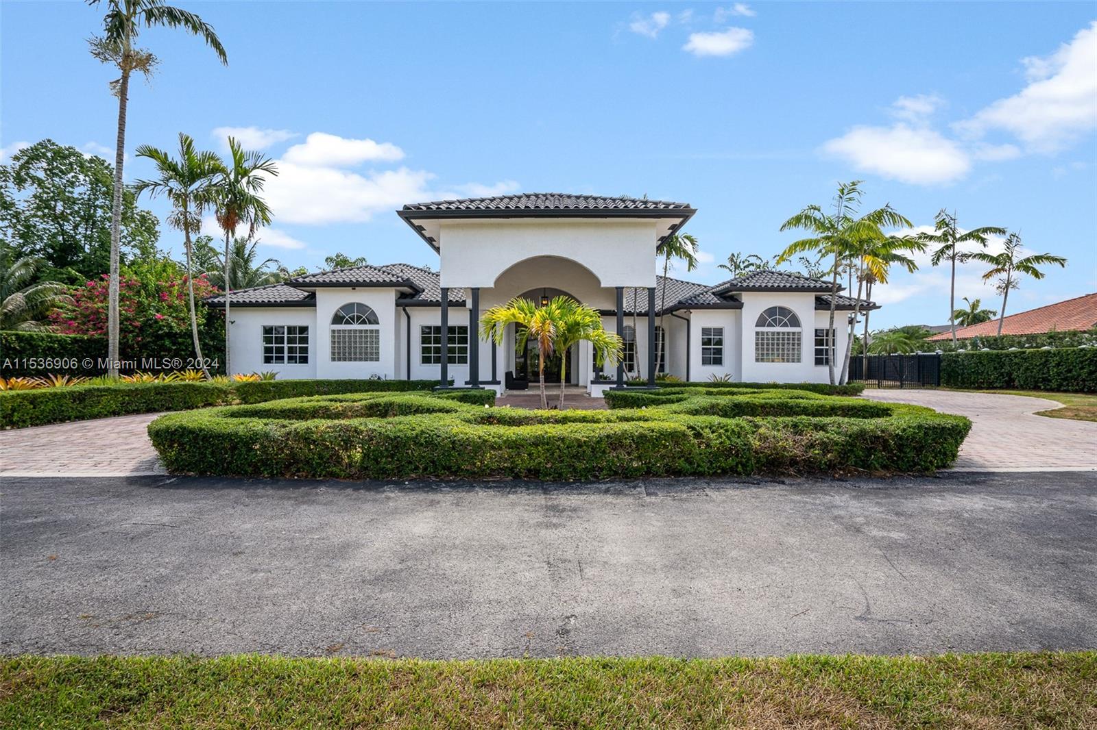 J G Heads Farms Subdivision, one of Miami's most desirable communities, offers a new listing for sale. This prestigious home has gone through extensive repairs and updates. Come and view this MASSIVE home. It is the largest luxury home in the area offering almost five thousand square feet of living area. This home has custom designed doors, volume and tabletop ceilings, freshly painted, polished travertine flooring, new appliances, fixtures, landscape completed, pressure washed pavers and more. Make this beautiful home yours with plenty of space to create more!
