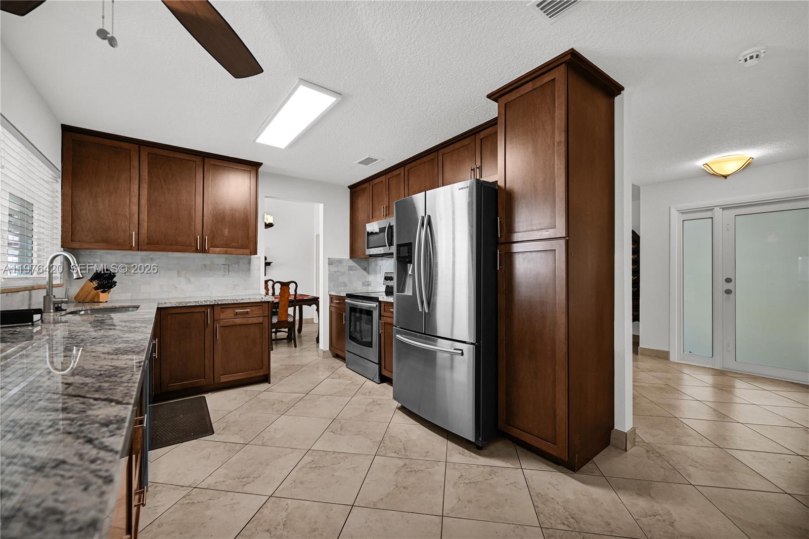 FLAMINGO GARDENS-PHASE TW - Residential Lease