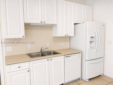 Tiny photo for 4950 Washington St #12-4, Hollywood, FL 33021 (MLS # A12046046)