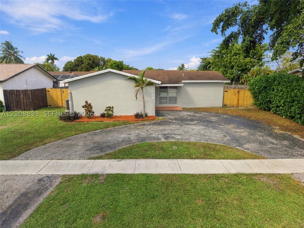 Photo of 9611 Johnson St, Pembroke Pines, FL 33024 (MLS # A12108833)