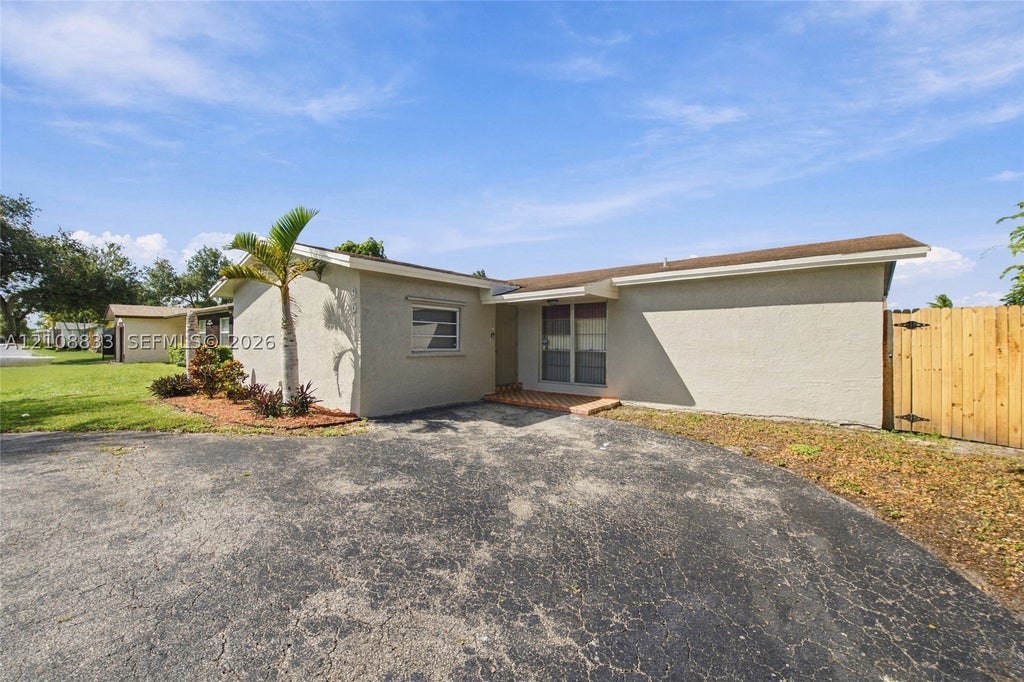 Photo of 9611 Johnson St, Pembroke Pines, FL 33024 (MLS # A12108833)