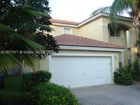 Photo of 7733 NW 17th Ct, Pembroke Pines, FL 33024 (MLS # A11877317)