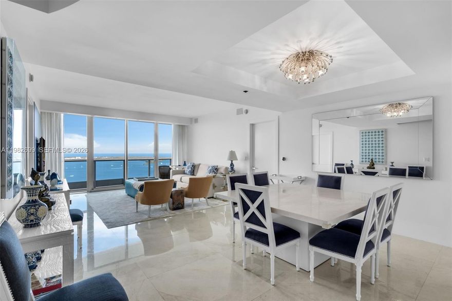 Enjoy breathtaking water views from this beautifully remodeled 2-bedroom + den, 3-bath residence at the iconic Jade Residences in Brickell. This bright and spacious home features elegant marble floors, an open-concept Italian kitchen with premium Miele appliances, and floor-to-ceiling glass that fills the living spaces with natural light. The thoughtfully designed layout connects the kitchen, dining, and living areas seamlessly, creating the perfect setting for both everyday living and entertaining. The spacious primary suite offers a spa-inspired bathroom with a large walk-in shower. Residents of Jade enjoy world-class amenities including a waterfront pool, state-of-the-art fitness center, spa services, and 24-hour concierge and valet. Ideally located just steps from Brickell’s top restaurants, shops, and nightlife, and minutes from Brickell City Centre.