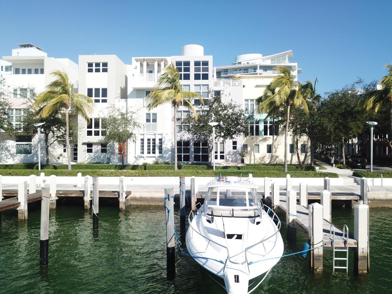 Wake up to water views and step right onto your boat from your private dock. This Miami Beach townhouse offers the perfect balance of luxury and leisure with open interiors, seamless indoor-outdoor living, and a nice little terraza overlooking the water. Nestled in a gated community just minutes from the ocean, Bal Harbour, and Miami’s finest restaurants, this is more than a home — it’s the South Florida lifestyle at your doorstep.