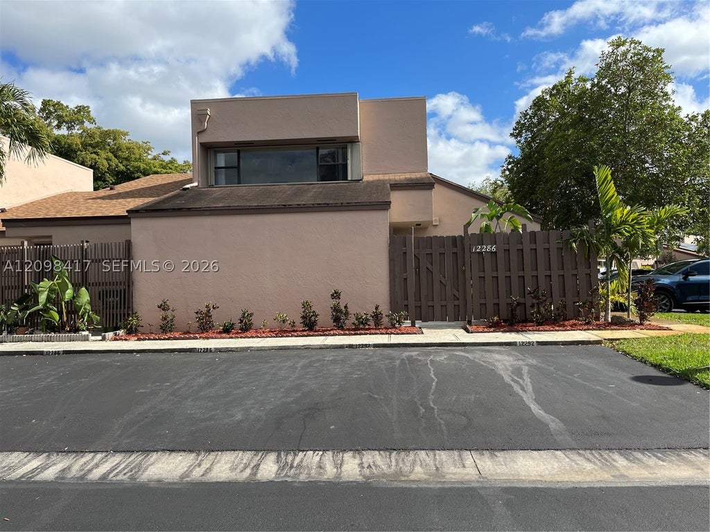 Photo of 12286 NW 13th Ct, Pembroke Pines, FL 33026 (MLS # A12098417)