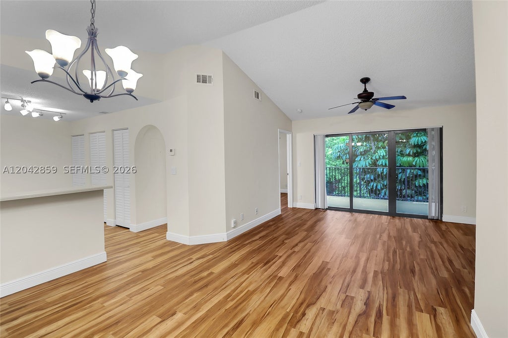 Photo of 10111 W Sunrise Blvd #303, Plantation, FL 33322 (MLS # A12042859)