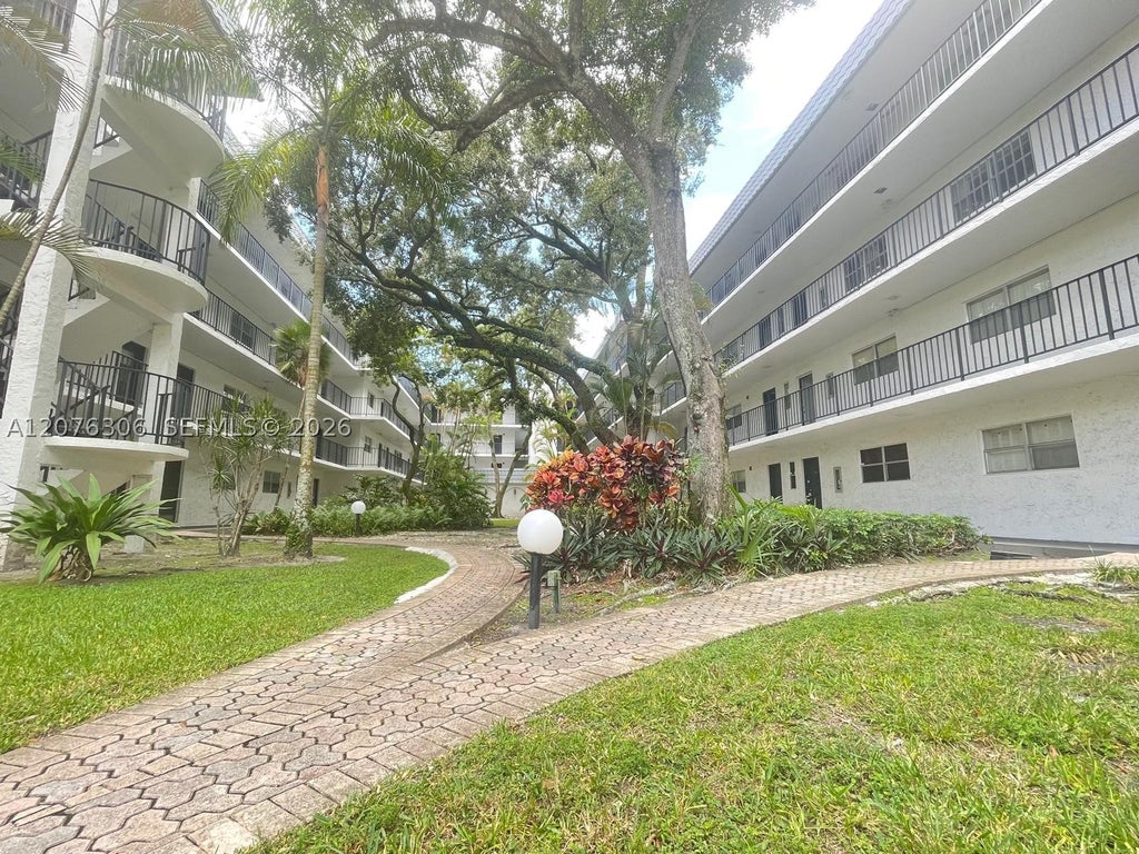 Photo of 3280 Spanish Moss Ter #103, Lauderhill, FL 33319 (MLS # A12076306)
