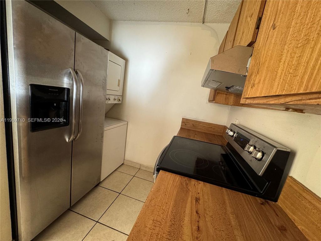 Photo of 1024 Twin Lakes Dr #21-F, Coral Springs, FL 33071 (MLS # A11969710)