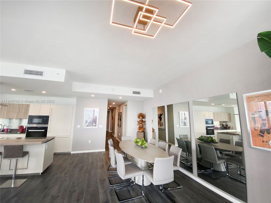 Enjoy breathtaking sophistication in this superb Brickell Flatiron 53rd Penthouse, fully furnished and  Equiped 2,342 SF Per developper! Soaring above the Miami skyline, this unit spares no expense with its 10 feet ceilings, custom interior design with grade Miele appliances, with Italian marble flooring in bathrooms, exquisite custom designed closet cabinetry. Over 150k+ spent in upgraded. Elliptical wraparound balconies open up to dramatic panoramic bay skyline views. Indisputably the most luxurious building in Brickell, one of Miamis hottest area, Flatirons acclaimed amenities include 1st-class wellness and recreational facilities on the top floor:Pool, Spa, gym