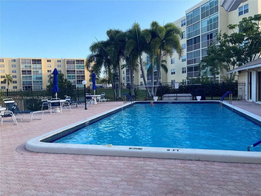 Price just Reduced!! East of US1, NO AGE RESTRICTION, CAN RENT AFTER ONE YEAR OWN!!  located in a quiet Residential Neigborhood, very Spacious Condo, well kept 2 Bedrooms 2 full baths, Furnished, ENCLOSED FLORIDA ROOM, Hurricane Impact sliding door, and all Windows, Double front door. Gorgeous Lake front view, New Electrical Panel, New A/C, Newer Electric Tankless Water Heater. Bike to Dania Beach & Hollywood Beach Boardwalk, Close by all Shopping, Dania Pointe with Cafe Terrace, Restaurants & lots of Intertainement, less than 8 minutes driving to Airport & the Everglades Sea Port. Easy access to Major Highways. Building is working on their 40 Years Inspection. Easy to Show! Ready to occupy! Please Text Listing Agent Marguerite