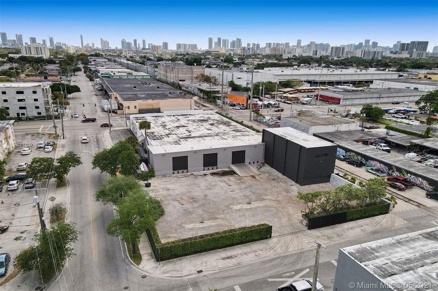 Entire block for sale in Miami's hottest area of Allapattah (33142) , blocks away from the Plaza , Wynwood and the Miami River. 22000 square feet on over 38000 sqft lot on the corner of 22 avenue NW and 23 street . property has 3 doors 2 with dock height and one of them street level with ramp . New bathrooms and new impact windows and doors as well as gated parking lot for trucks or over 34 cars .  backup generators. Railroad adjacent to the property , Property works for national corporation or wholesaler and or showroom or for distribution center . Seller can either sell or lease or can work out a lease option or purchase . Easy to show property is vacant , please call L/A for more details. Allowed use:  office building ( 8 stories ), Educational, Lodging, Residential, Storage facility .