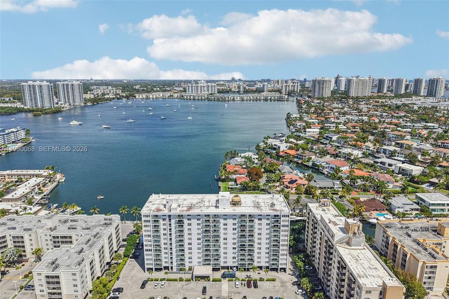 Enjoy waterfront living in this well-maintained 1-bedroom, 1.5-bath condo in the heart of North Miami Beach. Located on the 6th floor, this unit offers beautiful water views, plenty of natural light, and a spacious, functional layout. The open living and dining area leads to a private balcony, perfect for relaxing or entertaining. The kitchen provides ample cabinet space, while the generously sized bedroom includes great storage and an en-suite bath, plus a convenient half bath for guests.  Polished concrete ready for the next owner to choose tile or an alternate flooring with sound proofing. Secured building with amenities including a pool, fitness center, and assigned parking. Ideally located just minutes from beaches, shopping, dining, and major highways for easy commuting.