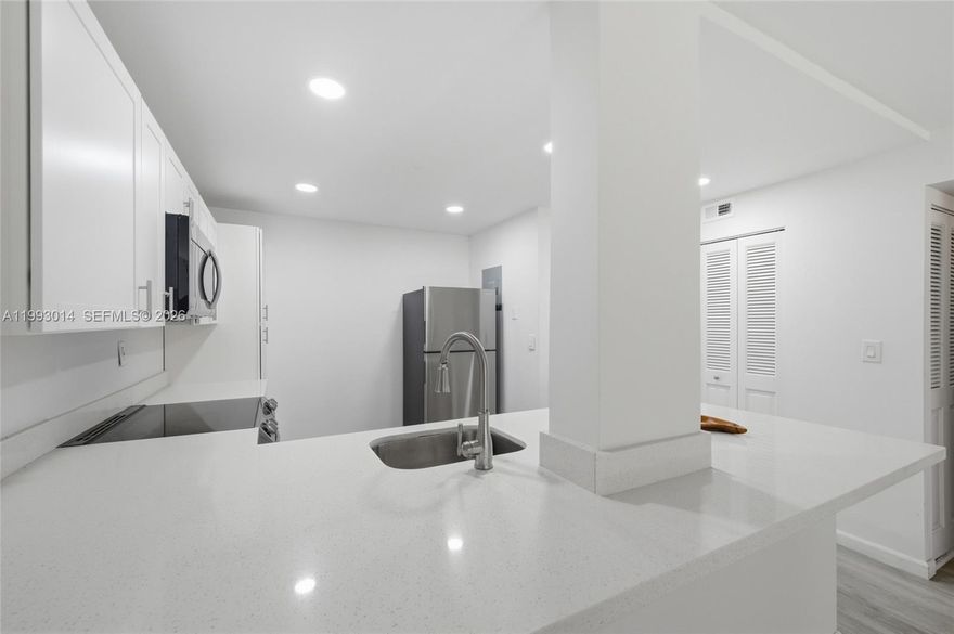 WELCOME HOME to this beautifully updated 2-bedroom, 2-bath condo, with a BRAND NEW ROOF and WASHER/DRYER IN-UNIT! Located in the desirable Concord Village 55+ community. This bright, light-filled 2nd-floor unit offers a spacious open-concept layout with new flooring, a modern kitchen, and renovated bathrooms, creating a comfortable and move-in-ready living space. Large screened-in private balcony overlooking peaceful golf course and garden views. Additional features include an in-unit washer and dryer, generous closet space, and abundant natural light throughout. Storage included on same floor. Residents of Concord Village enjoy resort-style amenities including three sparkling swimming pools, a fitness center, clubhouse, tennis courts, and beautifully manicured grounds. Conveniently located near HCA Hospital, major highways, shopping, and dining. Ideal for full-time living or a seasonal retreat. One resident must be 55+. No occupants under 18. Association covers general outside maintenance, outside insurance, roof, basic cable, water, waste.