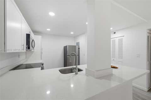 Photo of 7950 W Mcnab Rd #222, Tamarac, FL 33321 (MLS # A11993014)