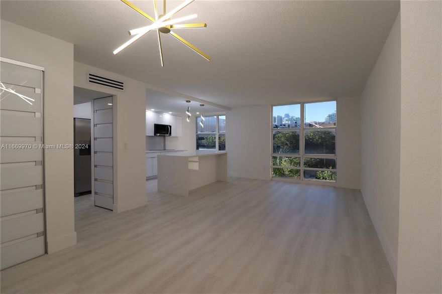Discover your dream home in this stunning, fully renovated condo located just steps from the beautiful beaches of Sunny Isles. Renowned for its luxurious beachfront lifestyle, this 1 bedroom and 1.5 bathroom unit is within walking distance to pristine beaches, upscale dining establishments, premier shopping, and recreational parks. Brand new upgraded modern finishes throughout, including kitchen, flooring, fresh paint, and contemporary lighting. Open concept design with abundant natural light. Additional conveniences include assigned parking, on-site laundry facilities and great pool. Don't miss out on the opportunity to live in one of Sunny Isles' most desirable condo communities.