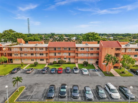 Photo of 8852 W Mcnab Rd #203, Tamarac, FL 33321 (MLS # A12064180)
