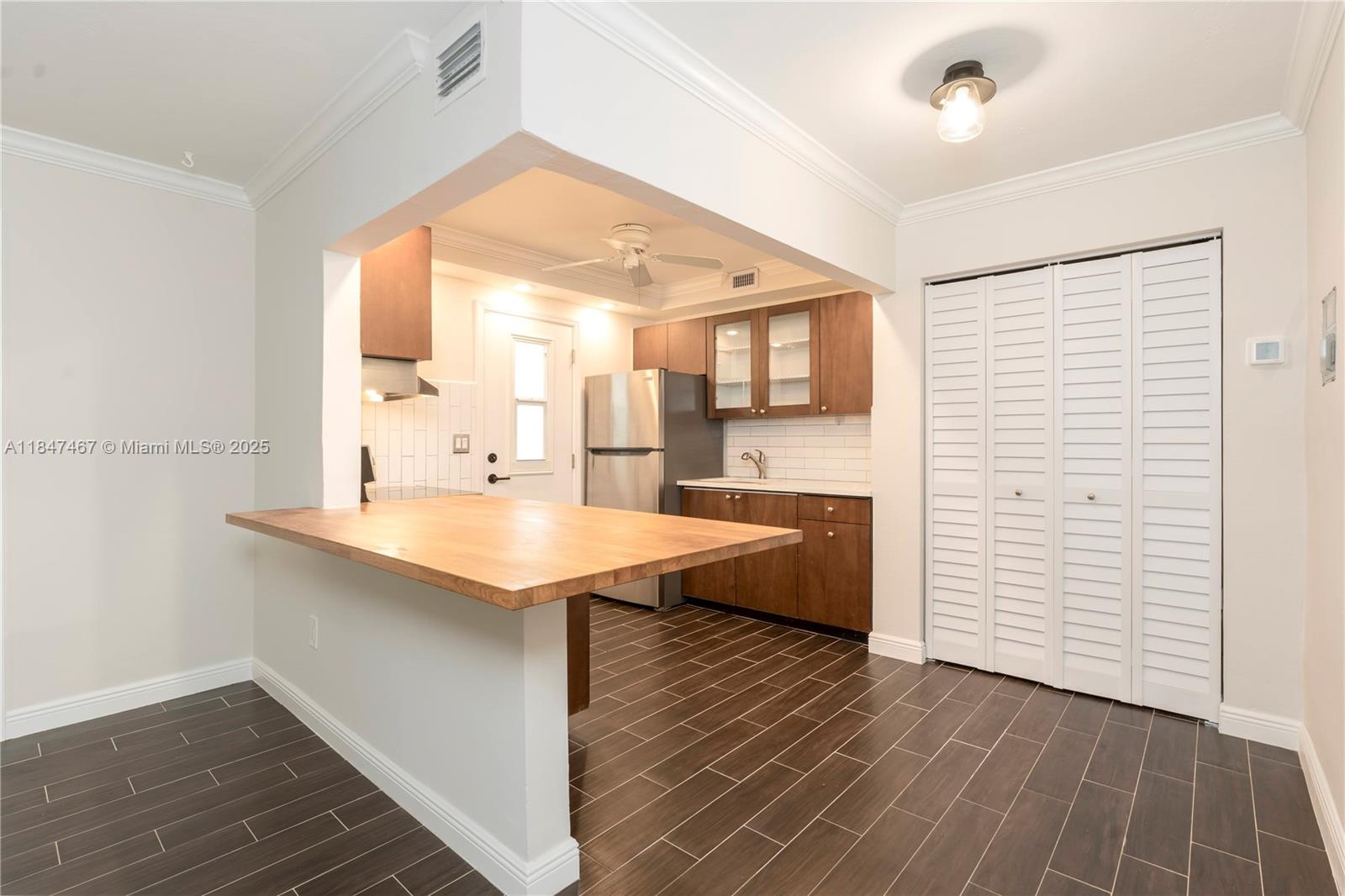 Beautifully Renovated 2-Bedroom Condo in the Heart of Coconut Grove. Move right into this completely updated first-floor unit featuring 2 spacious bedrooms and 1 modern bathroom. Freshly painted and tastefully finished, this home offers a sleek kitchen with stainless steel appliances and ample cabinetry. Enjoy the convenience of two parking spaces, all in a well-maintained building. Perfectly situated in the vibrant heart of Coconut Grove—just minutes from premier shopping, parks, marinas, restaurants, and entertainment.