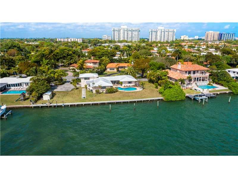 One of the best bayfront opportunities in all of Miami!!! Miami Shores bayfront home on prime cul-de-sac, 204 feet facing directly south on Biscayne Bay with views of South Beach and the cruise ships-- TWO FULL BAYFRONT LOTS. Build one or two homes with a mazing views in serene east Miami Shores location. 10 minutes from the ocean. This is a boater's dream!