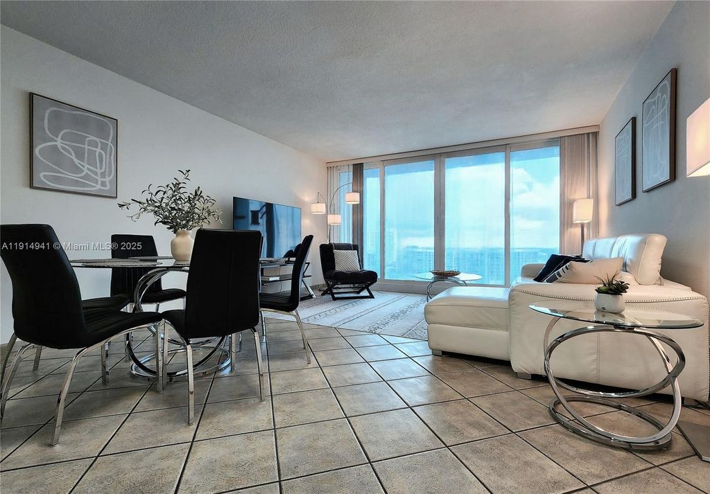 Photo of 3505 S Ocean Dr #1202, Hollywood, FL 33019 (MLS # A11914941)