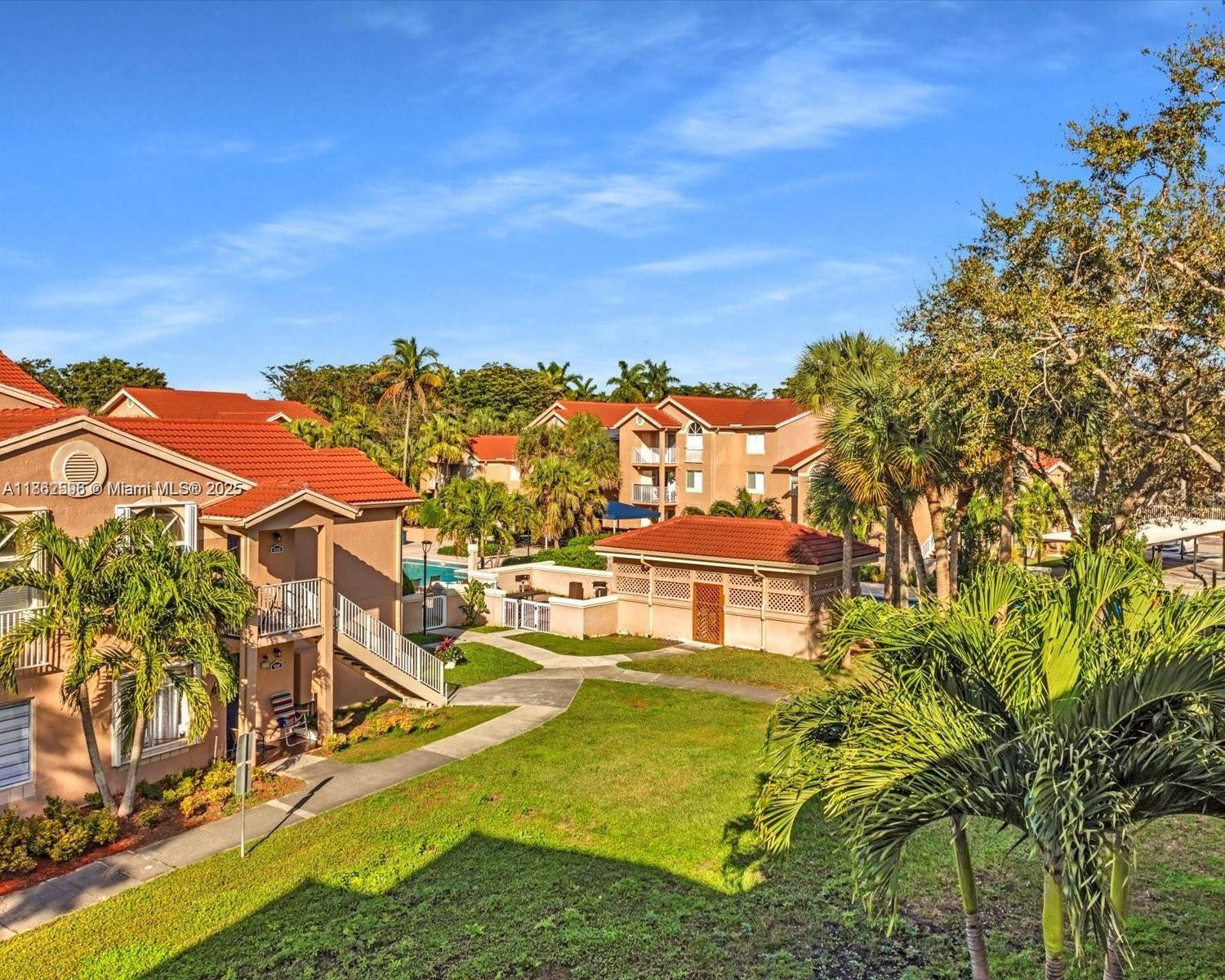 Discover this beautiful top-floor condo in Kendall's esteemed Hammocks Community. This move-in-ready 2-bedroom, 2-bathroom home features an open, bright layout with vaulted ceilings and plenty of natural light. The split bedroom design ensures privacy, and the unit includes tile flooring throughout, an private balcony with extra storage, and an in-unit washer and dryer. Freshly painted with no special assessments, this condo is an ideal investment—leasing is permitted immediately. The HOA covers water, sewer, and pest control. Residents enjoy community amenities like a pool, playground, and gated security. Located near parks, shopping, dining, and highly-rated schools, this is a must-see opportunity in South Florida. The owner is motivated—don’t wait!