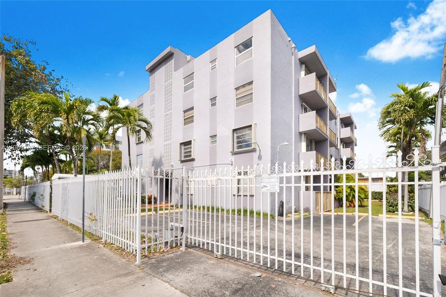 In the heart of Miami! Beautiful top-floor corner unit substantially remodeled and filled with natural light, offering views of the pool and Marlins Stadium. Located in a gated community with access through an electric gate to your assigned parking space. Kitchen features white cabinetry, brand-new quartz countertops and quartz backsplash, plus a new undermount sink. Freshly painted interior with bright open living area. Two spacious bedrooms with new blackout shades and impact windows. Enjoy a well-maintained community with pool, laundry room, new roof, and new elevator. Prime location near Downtown, Brickell, highways, schools, shopping, restaurants, and just 15 minutes to MIA.