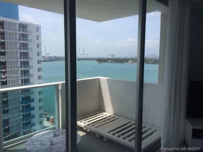 AVAILABLE SEPTEMBER 6th - Large remodeled studio at the Mirador South with great bay view of downtown skyline and Star Island; GARAGE PARKING INCLUDED. Full service building in the heart of South Beach, directly across from Whole Foods/Starbucks and more shopping. Plenty of closet space, full size kitchen and large balcony. Pool, jacuzzi on the bay, doorman/security. Basic/cable and internet are included in the rent.