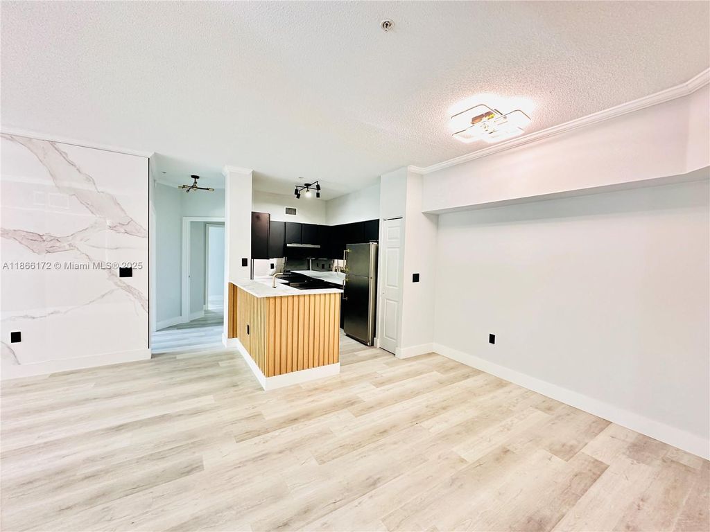 Photo of 11637 W Atlantic Blvd #1233, Coral Springs, FL 33071 (MLS # A11866172)