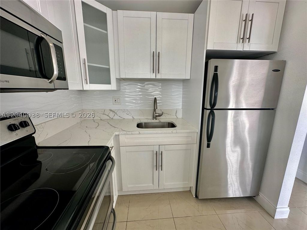 Photo of 241 SE 9th Ave #207, Pompano Beach, FL 33060 (MLS # A12040038)