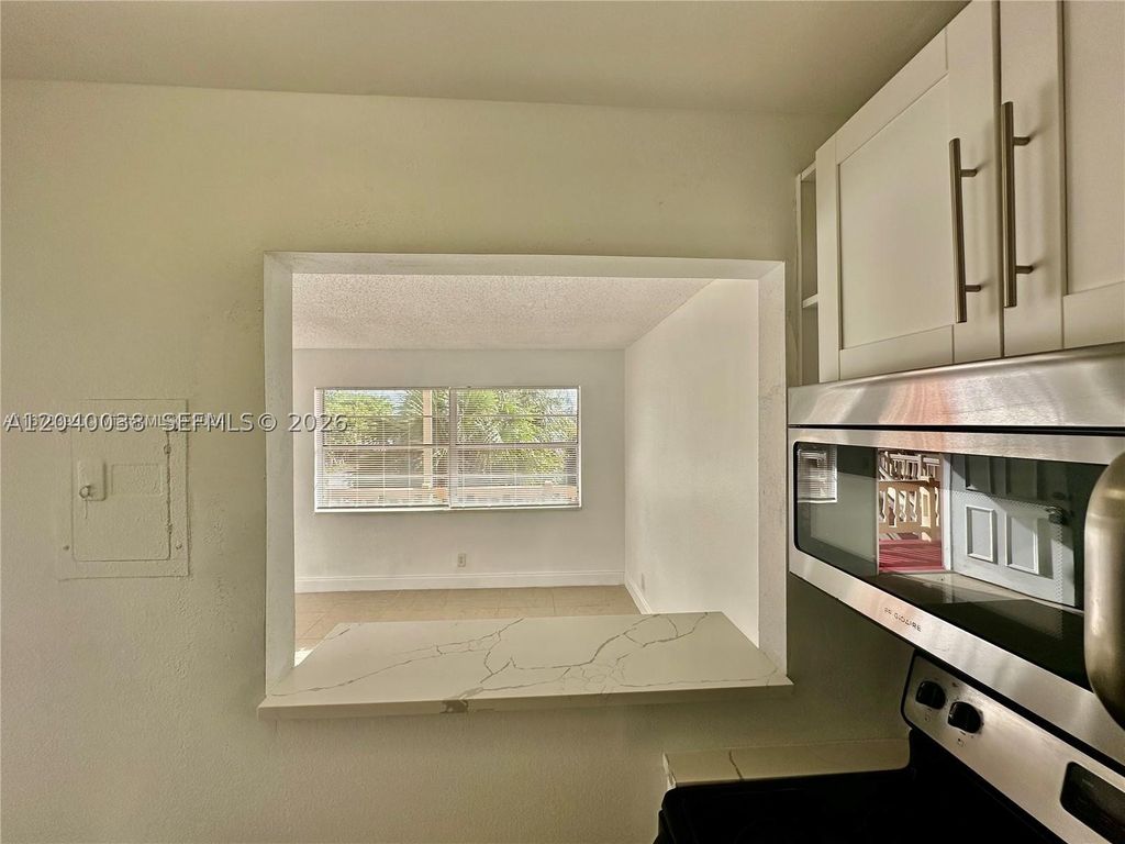 Photo of 241 SE 9th Ave #207, Pompano Beach, FL 33060 (MLS # A12040038)