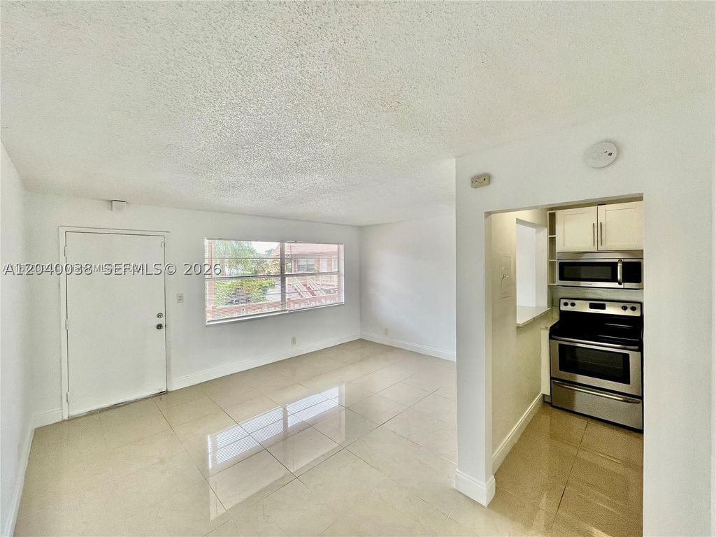 Photo of 241 SE 9th Ave #207, Pompano Beach, FL 33060 (MLS # A12040038)
