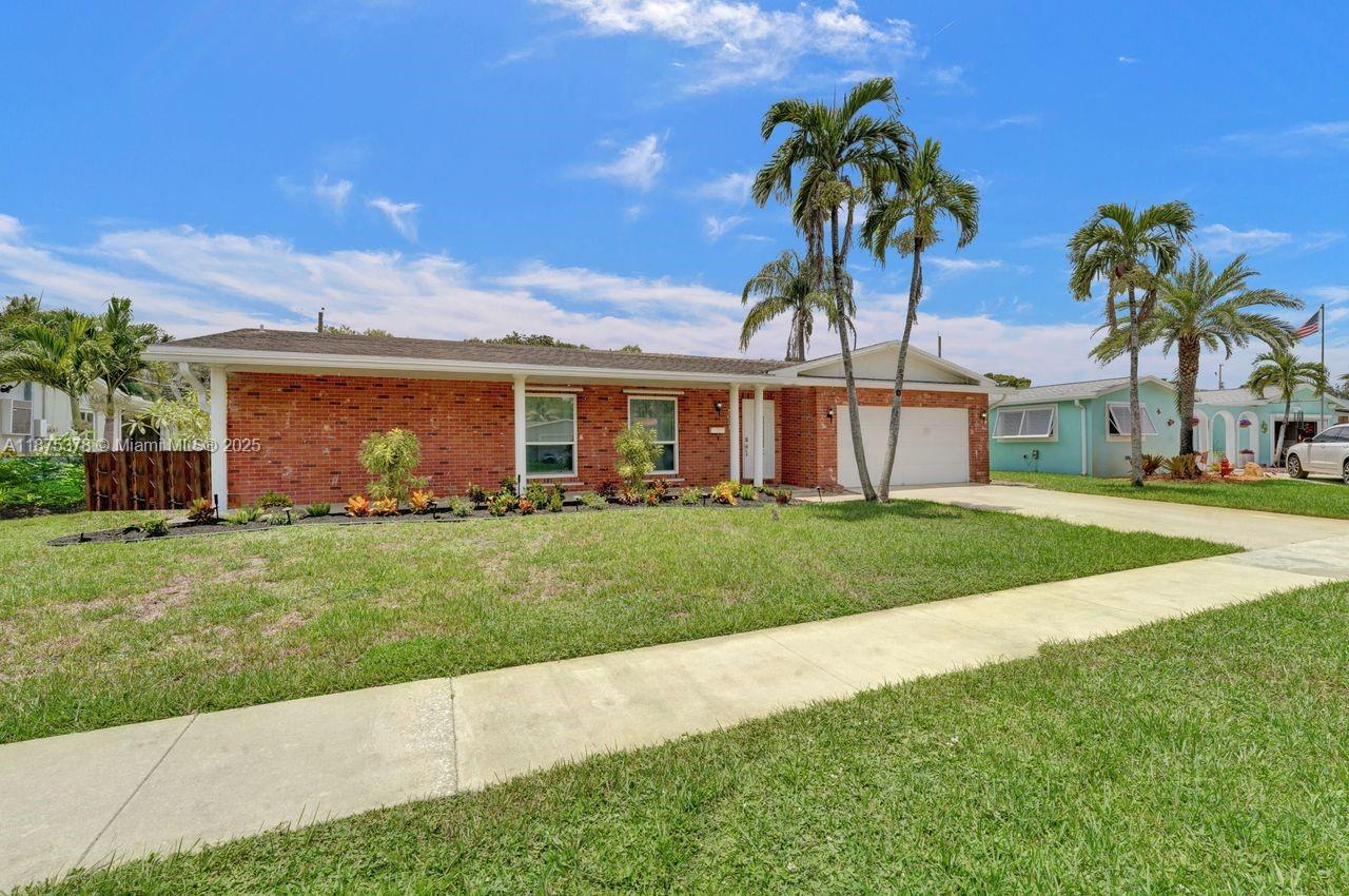Beautiful one story pool home in highly sought after Cooper Colony Estates in Cooper City. Home shows great with 5 bedrooms and 3 baths incl. converted garage with1/1 in-law suite and office. Very nice kitchen w/ granite tops, white cabinets and stainless steel appliances. All hurricane impact windows and doors throughout. Tile flooring in main areas and wood flooring in bedrooms. Gorgeous private backyard with fully covered patio to entertain friends and family overlooking pool area. This is a great area and neighborhood with good schools.