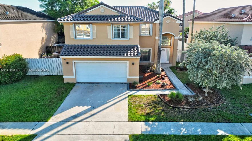 Exceptional opportunity to own a stunning 3-bedroom plus loft, 2.5-bathroom home in the prestigious Chapel Trail community of Pembroke Pines! Featuring an impressive open floor plan with dramatic volume ceilings and a formal dining area, this home is designed for both modern living and effortless entertaining. The beautifully updated kitchen is equipped with sleek stainless steel appliances, seamlessly connecting to the bright and spacious living areas. Enjoy ultimate peace of mind with a brand-new roof and a prime location in a safe, welcoming neighborhood celebrated for its top-tier, A-ranked schools and pristine parks. Conveniently located with quick access to major highways, shopping, and dining, this South Florida gem is an absolute must-see!