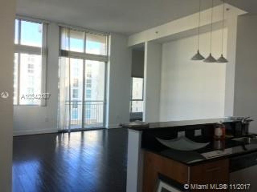 Large 1 bed 1 bath loft at Metropolis at Dadeland. Corner unit with 2 balconies. Stainless steel appliances with granite counter tops. Washer/dryer. Parking is very convenient & on the same level as unit. Call today to see it.