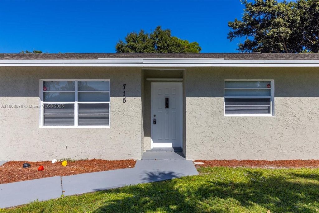 Photo of 715 SW Duval Ave, Port St Lucie, FL 34983 (MLS # A11903579)