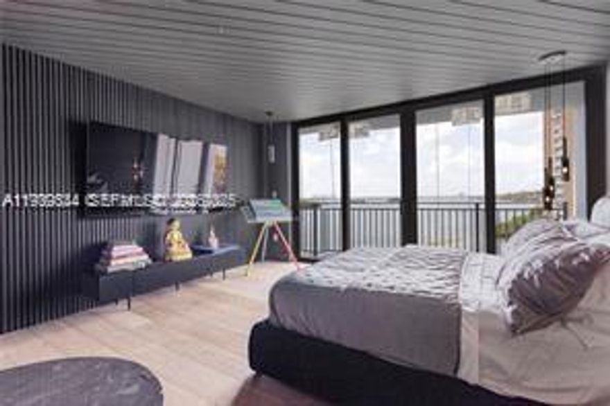 Sophisticated luxury studio offering refined modern design and premium finishes throughout. Expansive open layout enhanced by floor-to-ceiling windows that fill the space with natural light. Sleek kitchen with quartz countertops, custom cabinetry, and high-end appliances. Spa-inspired bathroom with designer fixtures. Residents enjoy exclusive amenities including resort-style pool, state-of-the-art fitness center, elegant lounges, and full-service concierge. Prime Miami location surrounded by dining, shopping, and cultural destinations.