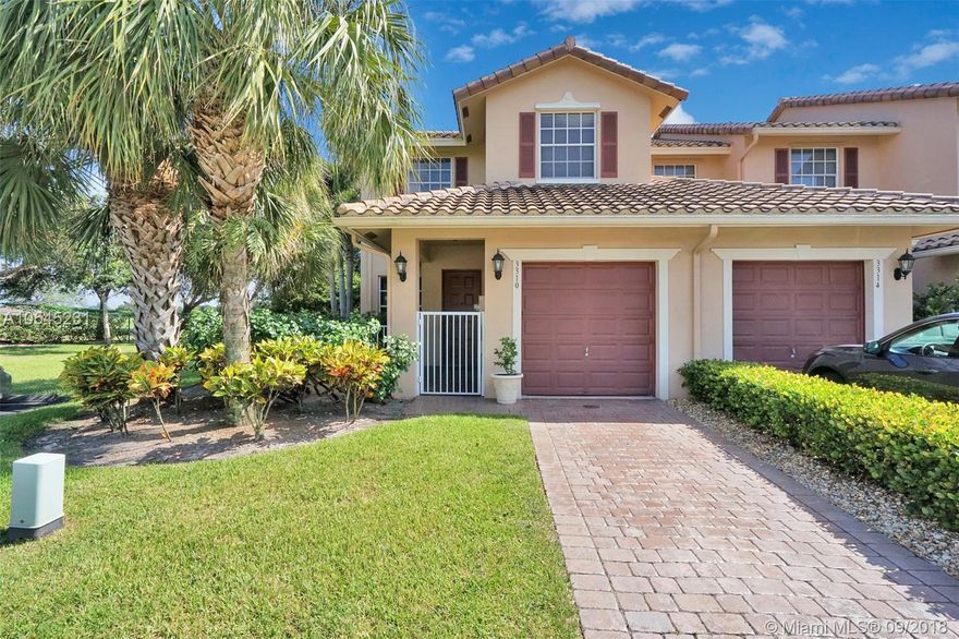 End unit right before cul-de-sac with lots of parking spaces, HUGE backyard for kids/pets, and calming views of the lake and Grande Oaks driving range. This 3 bedroom 2 1/2 bathrooms town-home is in pristine condition, with upgraded tile downstairs and wood floors upstairs, granite kitchen and large windows that make it feel like a house.  Garage with built-in storage, eat-in kitchen and family room overlooking the lake. Excellent location, close to main highways, universities, hospitals, shopping malls. The Villas of Rolling Hills is a great community just off University Drive between Griffin Rd. and I-595. Love it, live it, buy it!