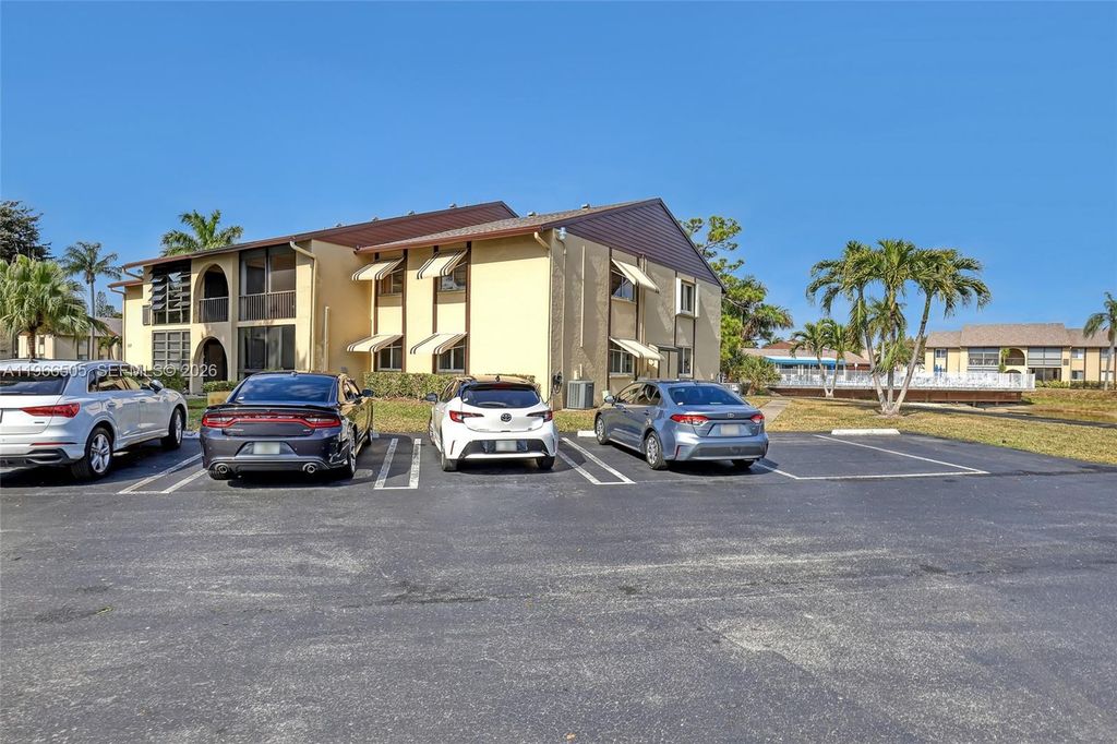 Photo of 337 Pine Ridge Cir #D-2, Green Acres, FL 33463 (MLS # A11966505)