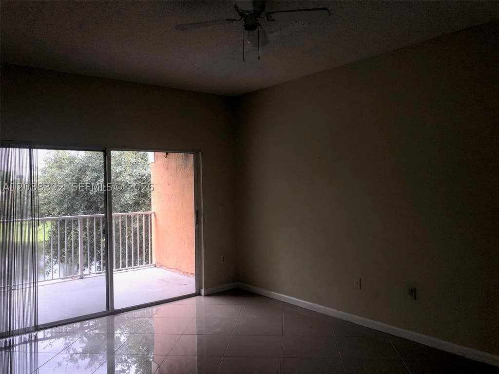 Photo of 6992 SW 39th St #I101, Davie, FL 33314 (MLS # A12038392)
