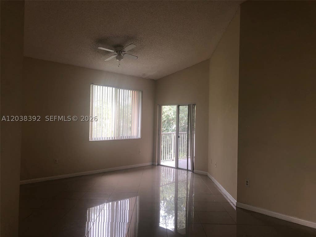 Photo of 6992 SW 39th St #I101, Davie, FL 33314 (MLS # A12038392)