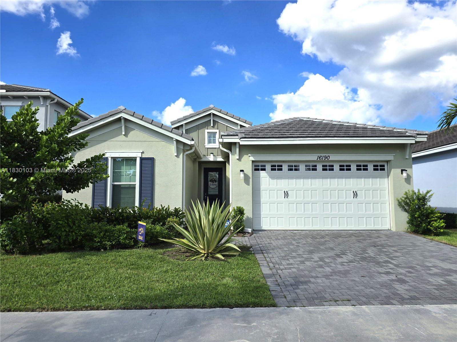Welcome to this beautiful 3-bedroom, 2-bathroom waterfront home located in the desirable Groves of Westlake community. This well-maintained residence features a spacious eat-in kitchen with quartz countertops, stainless steel appliances, and ample cabinet space. Enjoy upgraded tile flooring throughout, a formal dining area, and generously sized bedrooms.
The home also includes hurricane shutters, a standalone A/C unit in the garage, and a gorgeous waterfront view that adds to the serene atmosphere. Conveniently located near parks, shopping, and major roadways.
Don’t miss the opportunity to own this exceptional home—schedule your showing today.