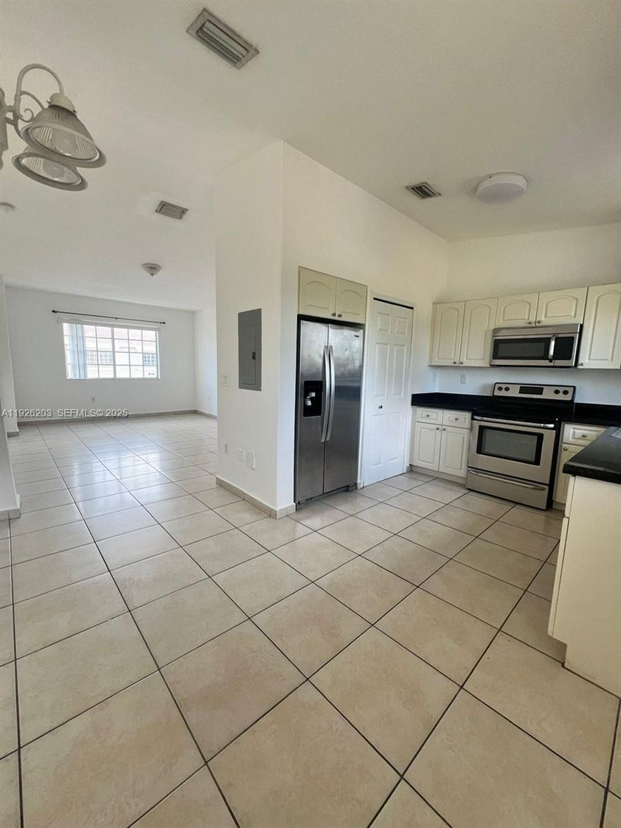 Spacious unit in convenient location near highways and shopping.  Laundry located inside unit.