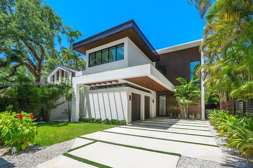 Elegant new construction home in the heart of Coconut Grove. This 2026 built 5-bedroom, 5.5-bath residence, offering 5,311 total SF and over 4,000 SF of living space, pairs timeless design with warm natural finishes, lush landscaping, and a seamless connection between indoor and outdoor spaces. Floor-to-ceiling windows introduce natural light into the homes thoughtfully designed interior. This home features top-of-the-line finishes, premium appliances, and comes equipped with an in-home elevator. Designed for both everyday living and effortless entertaining, the main living areas open to a covered terrace and flow directly into the backyard and pool. The primary suite is a standout retreat, complete with a spa-inspired bath, spacious walk-in closets, private terrace with summer kitchen, and an oversized shower with an integrated steam room for a true wellness experience at home. Positioned on one of the North Grove’s most desirable streets, minutes from top-rated schools, CocoWalk, parks, marinas, and the neighborhood’s best dining and boutiques.