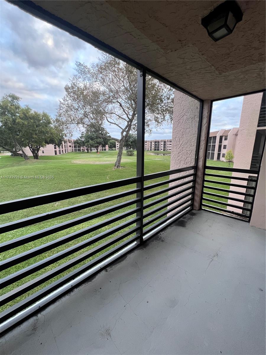 Perfect Winter Escape in Tamarac’s 55+ Community! This spacious 2-bedroom, 2-bathroom second-floor condo is ideal for seasonal residents or year-round living, featuring serene golf course views from a screened-in patio. With roomy interiors ready for your personal touch, this condo offers both potential and comfort. The active community boasts top amenities, including a heated pool, fitness center, clubhouse, tennis and pickleball courts, billiards, and regular social events—perfect for staying active and connected. Maintenance fees cover cable, water, and internet for added convenience. This condo is situated near shopping, dining, and major highways and provides an ideal blend of relaxation and accessibility. Priced to sell! Association approval is required.