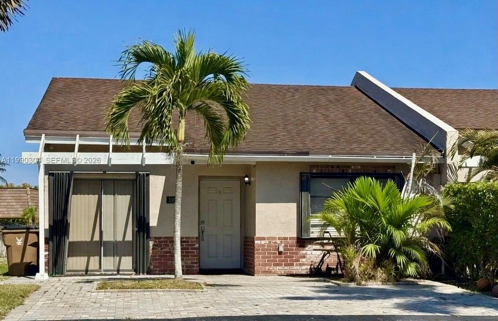 Photo of 1061 NW NW 53rd St, Deerfield Beach, FL 33064 (MLS # A11990304)