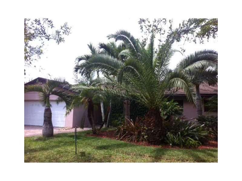 The most spectacular interior in the area, contemporary,open floor plan and clean look. Marble floors throughout and Brazilian sherry sunken living room. Wood kitchen cabinets with granite countertops and stainless steel backsplash, separate wet bar. Fren ch doors leading to beautiful landscaped yard with pond with Koi's and waterfall. Children play set. 2 car garage. Paver driveway.Tenant occupied. Please do not disturb occupants. Call Listing agent for all appointments.