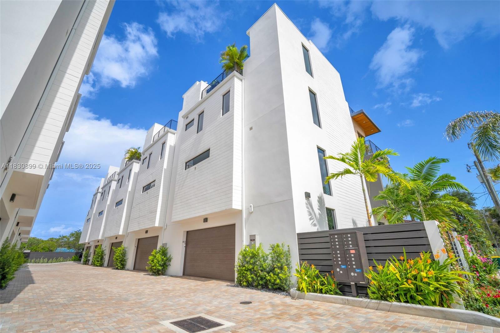 8Hundred North at Victoria Park is an exclusive community of just 10 modern luxury townhomes in East Fort Lauderdale. Ideally located minutes from the beach, parks, top-rated restaurants, shopping, gyms, and the vibrant energy of Las Olas Boulevard and Flagler Village.
This 4-story residence features 3 bedrooms, 3.5 bathrooms, and an open layout designed for seamless indoor-outdoor living. Highlights include Italian PEDINI® cabinetry, Sub-Zero/Wolf and Miele appliances, a spacious 2-car garage with EV readiness, tankless gas water heater, epoxy garage floors, custom shades, a private yard, and a large rooftop terrace with a fully equipped outdoor kitchen perfect for entertaining. *CALL OR TEXT LISTING AGENT TO SCHEDULE SHOWINGS BEGINNING ON 7/3/2025**