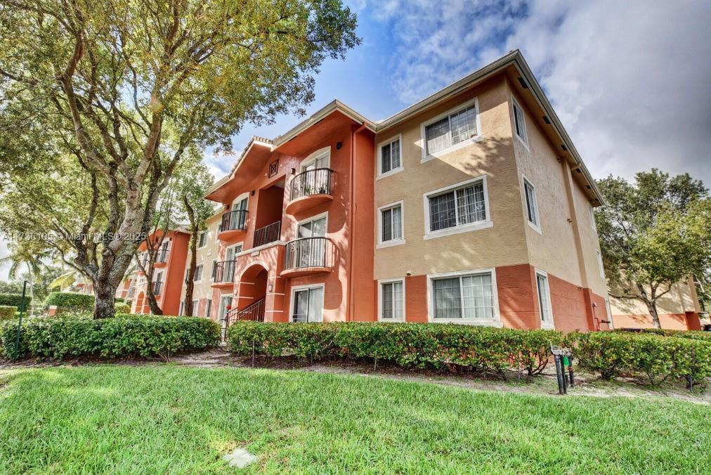 This beautifully maintained 2-bedroom, 2-bath condo offers a practical layout and is located in a highly sought-after gated community with fantastic amenities. The unit is in excellent condition, featuring spacious rooms, a functional design, and assigned parking. Enjoy the safety and privacy of a gated community, with easy access to shopping, dining, and major roads. Whether you're looking for a cozy home or an investment property, this condo is a great opportunity. Don’t miss out on this prime location and move-in-ready unit!--------------------special assessment of $104.49 monthly ending February 2033----------UNIT RENTED TILL 1/31/2026, PAYS $1,850.00 PER MONTH - 24hs notice in advance to show