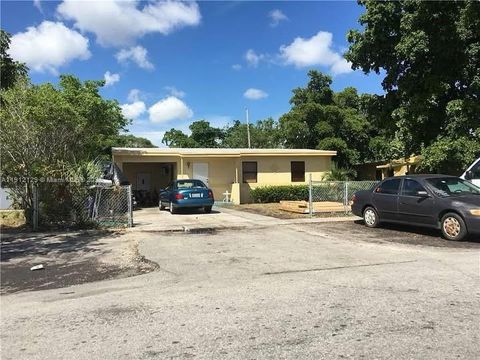 Photo of 1113 NW 10th Pl, Fort Lauderdale, FL 33311 (MLS # A11912129)