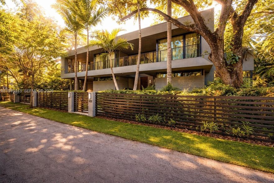 Stunning Coconut Grove home, featuring soaring ceilings and an abundance of natural light, the home was designed with high-end finishes and equipped with top-of-the-line appliances. The spacious layout includes two bedrooms on the main floor, a movie theater, expansive living and dining areas, and fully retractable doors that seamlessly connect the indoor and outdoor spaces. Upstairs, four additional bedrooms, including the lavish master suite, and another living room. The backyard is beautifully landscaped, with a serene pool surrounded by bamboo trees, creating a private oasis. Additional amenities include maid’s quarters and a two-car garage, plus 2 carport. The house is fully powered by solar panels and has 2 electric car plugs. Steps from Kennedy Park and 15 min walk to the center of the Grove. Truly the best lifestyle Miami has to offer. Quiet street with ample street parking.